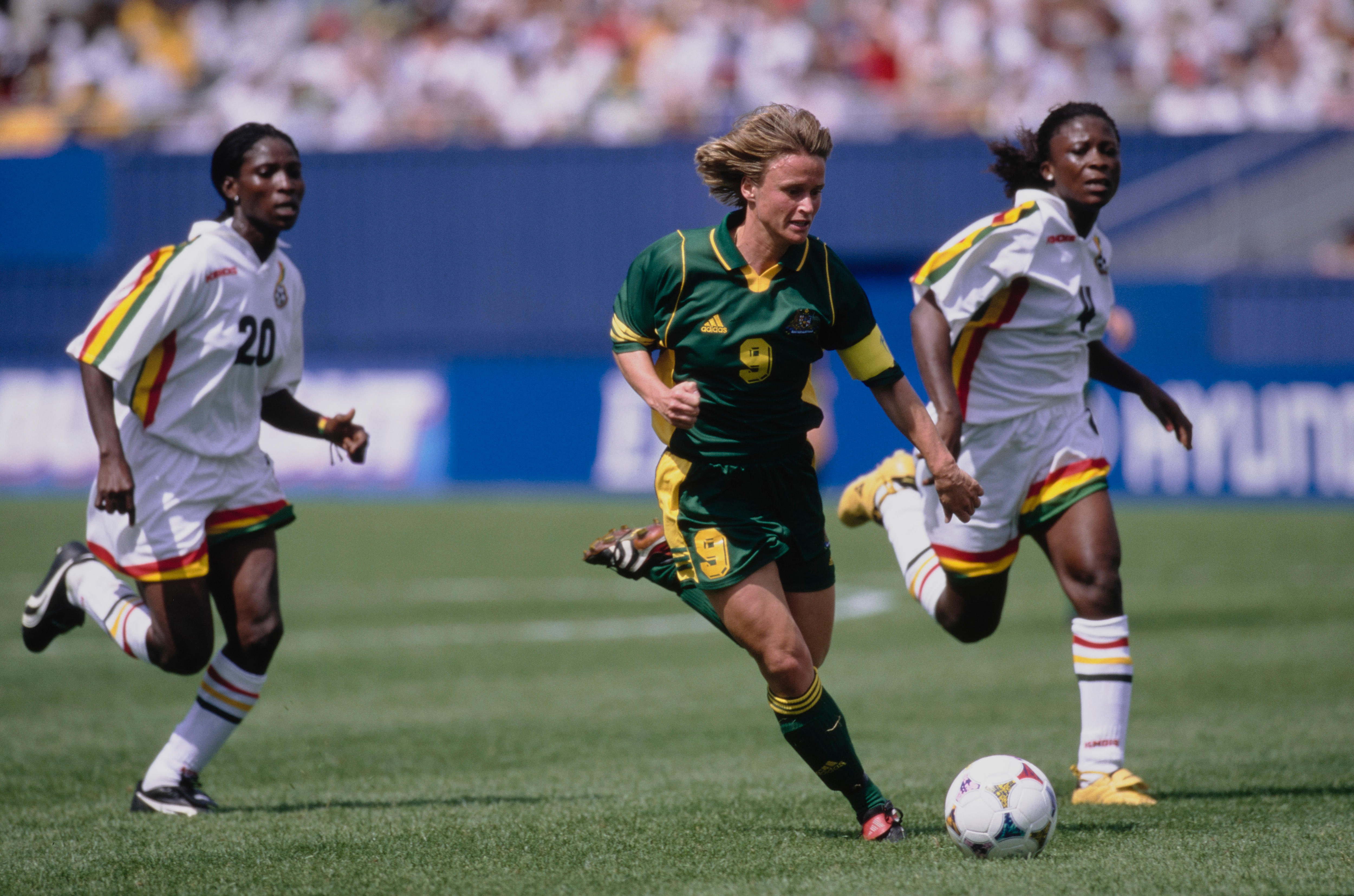 Julie Murray runs with the ball