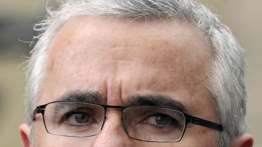 Independent MP Andrew Wilkie speaks at a press conference in Canberra