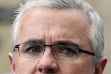 Independent MP Andrew Wilkie speaks at a press conference in Canberra