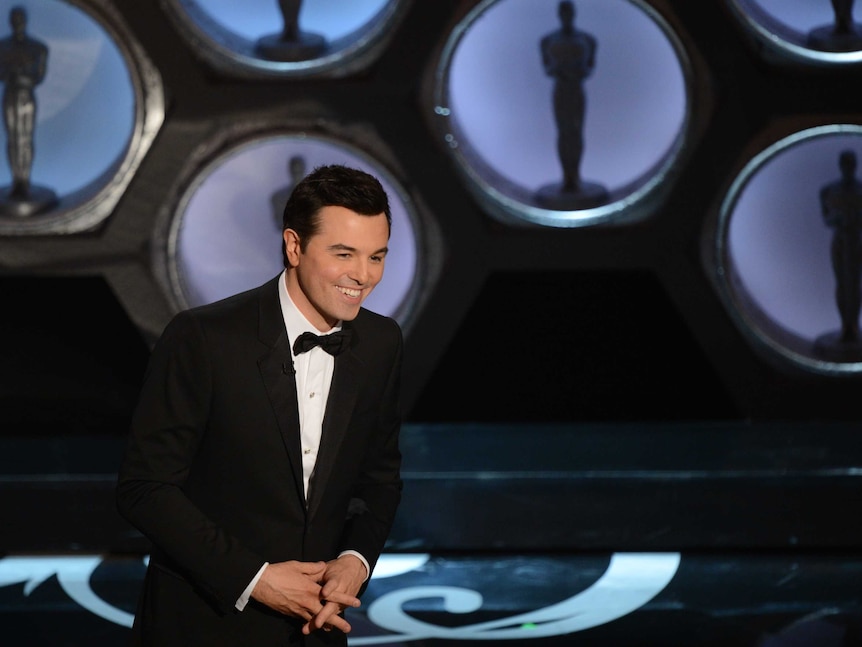 Seth MacFarlane speaks at the Oscars.