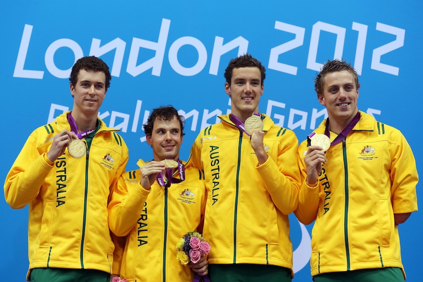 Winning smiles ... Andrew Pasterfield, Matthew Levy, Blake Cochrane and Matthew Cowdrey show off their relay gold