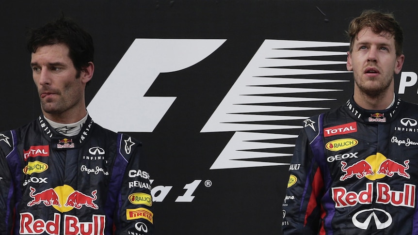 Mark Webber ignores Sebastian Vettel on the podium after the German ignored team orders to take out the Malaysian Grand Prix.