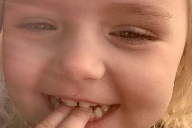 Smiling photo of three-year-old Rylee Rose Black wearing a silver tiara.