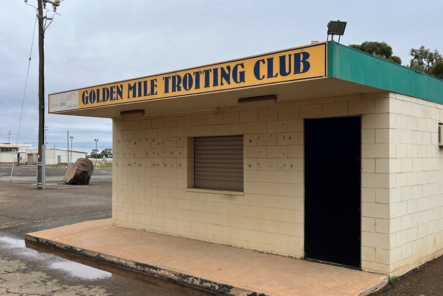 a building reading  Golden Mile Trotting Club 