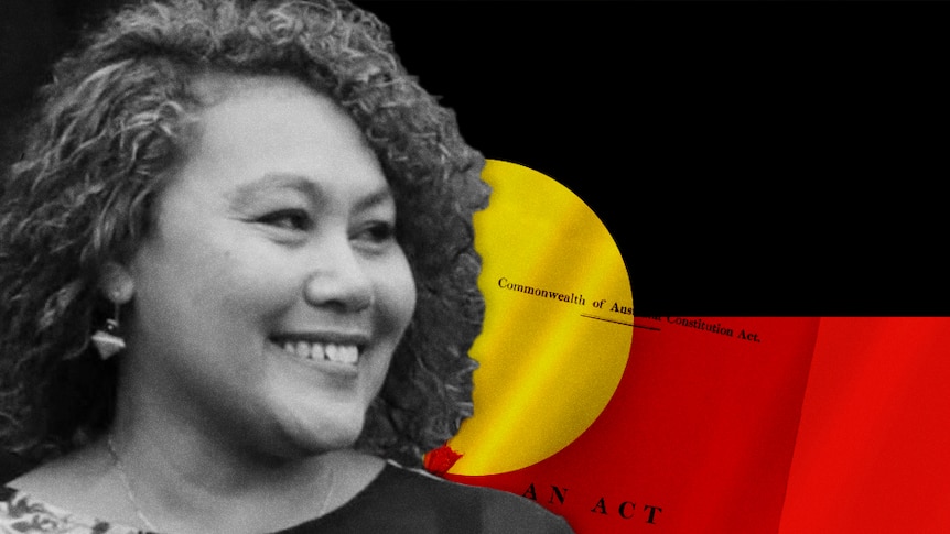 Reconciliation Australia CEO Karen Mundine with Indigenous flag and image of Constitution of Australia document