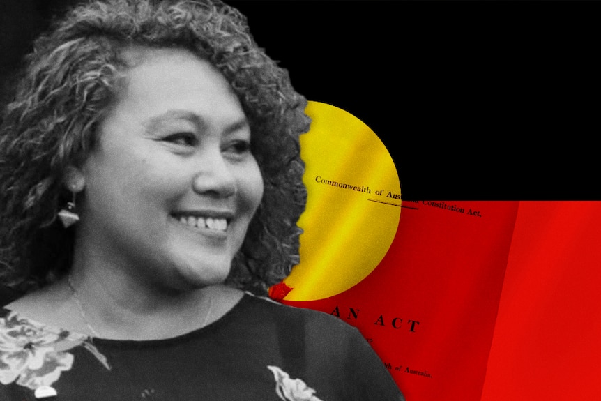 Reconciliation Australia CEO Karen Mundine with Indigenous flag and image of Constitution of Australia document