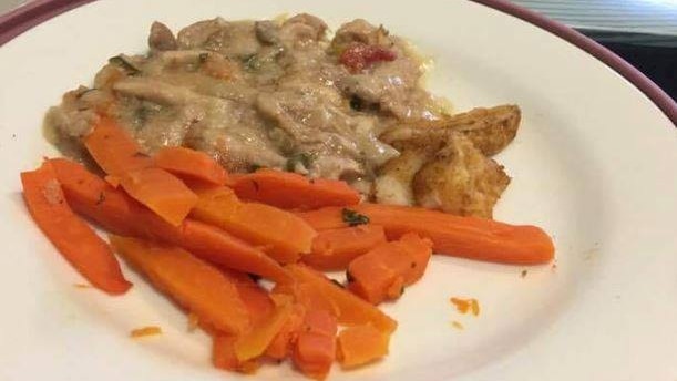 Carrots and gravy on a plate