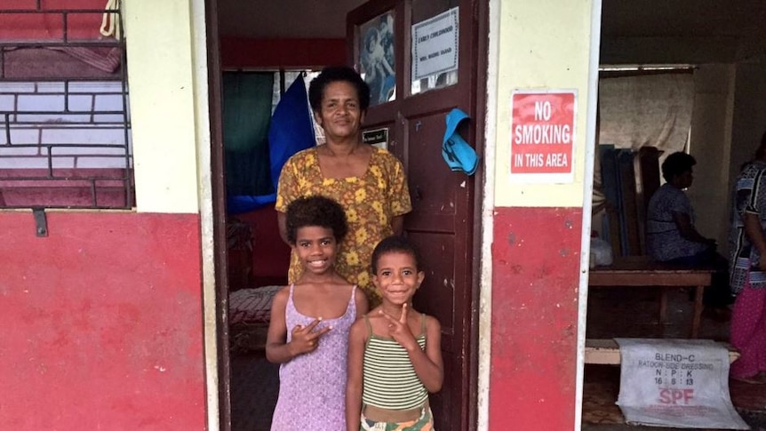 Seini Cawai with her family at an evacuation centre