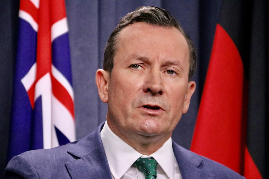 A tight head and shoulders shot of Mark McGowan speaking during a media conference.