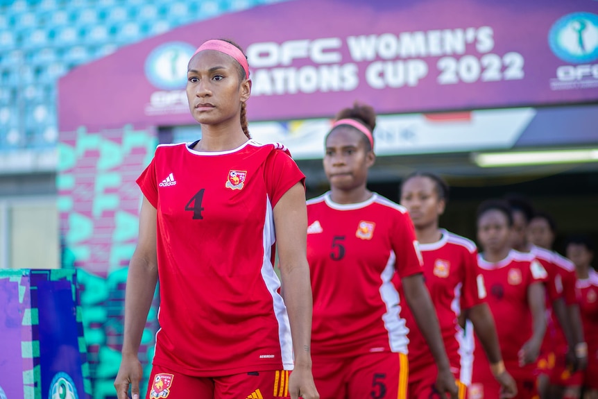 PNG womens football team walking out at the OFC Cup