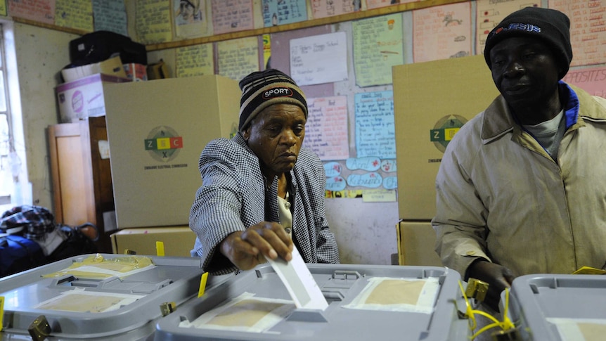 Zimbawean Chizema Najika, 80, casts her vote in a polling station in Harare.