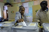 Zimbawean Chizema Najika, 80, casts her vote in a polling station in Harare.