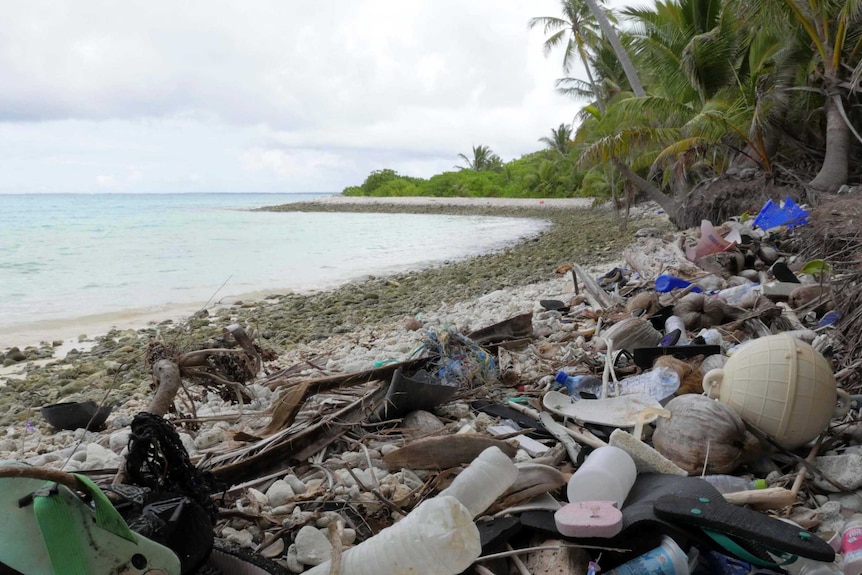 Plastic and rubbish debris on a beach on Direction Island in the Cocos Islands
