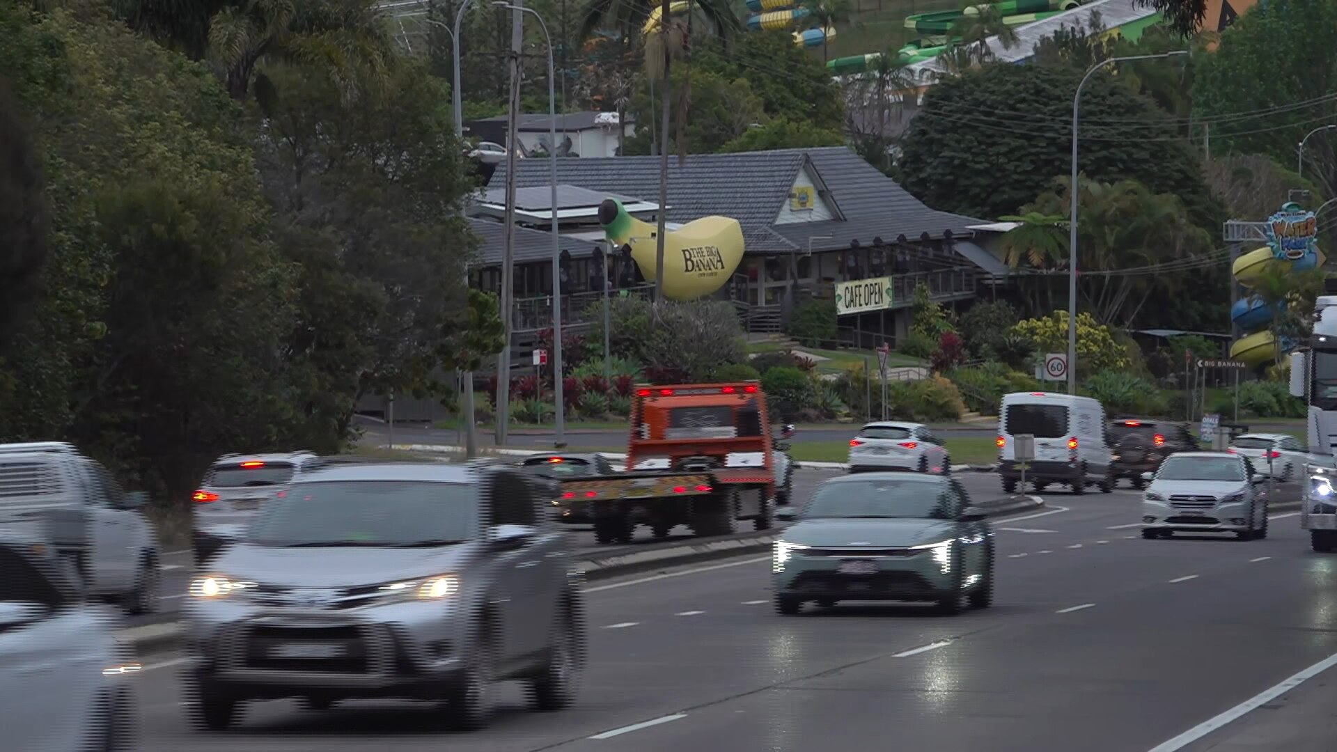 Traffic on the highway climbs the hill past the Big Banana.