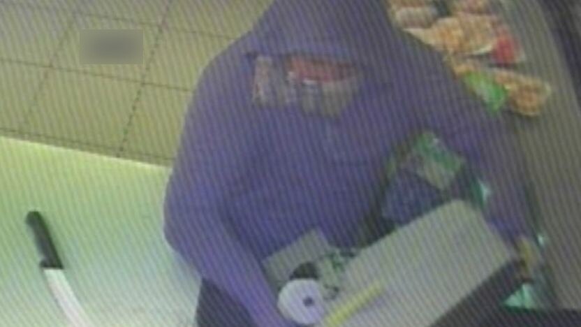Security camera footage shows the man stealing the cash register from the bakery after demanding cash.