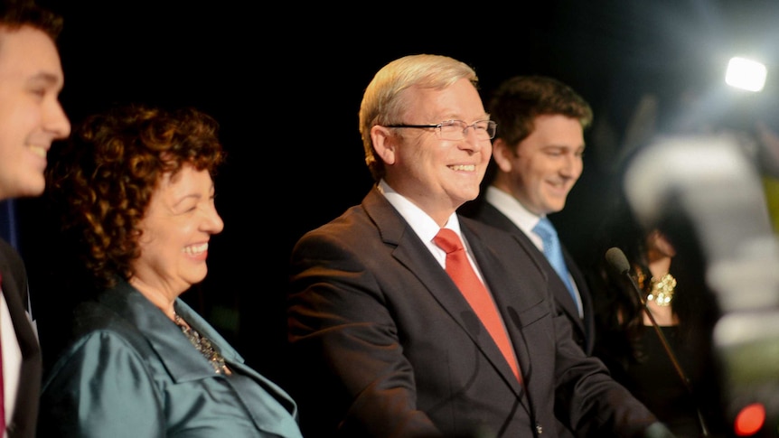 Kevin Rudd stands with his family during his concession speech.