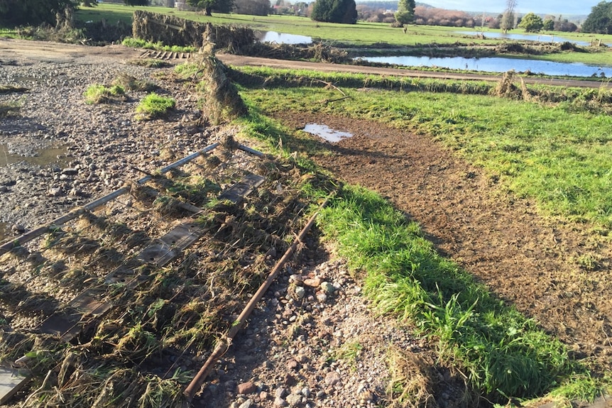 The power of the water ripped gates and tore out fences.