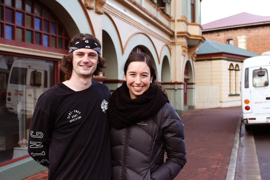 Tynan Wood and Alexia Cannizzaro standing out the front of the Zeehan theatre.