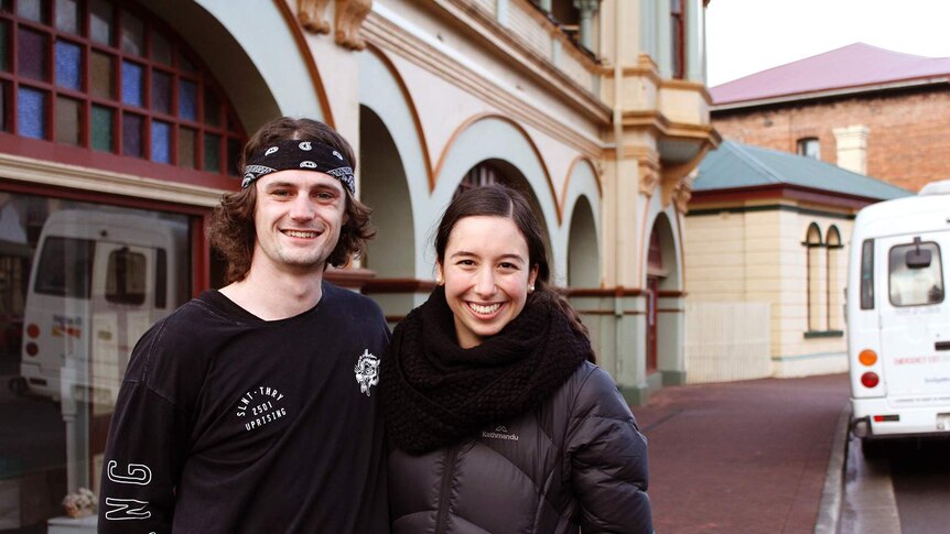 Tynan Wood and Alexia Cannizzaro standing out the front of the Zeehan theatre.