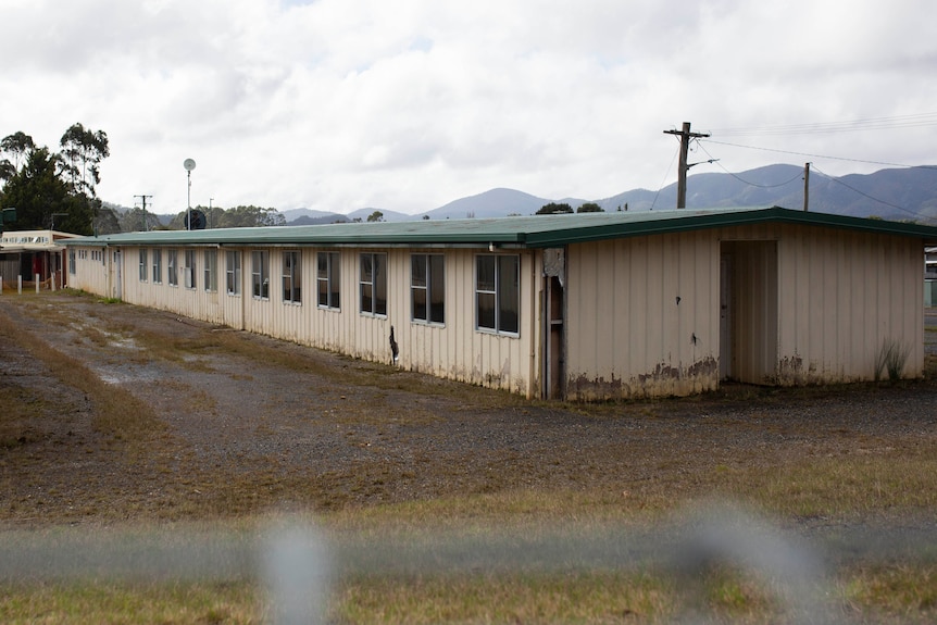  A building with multiple rooms used for single men working at a mine site