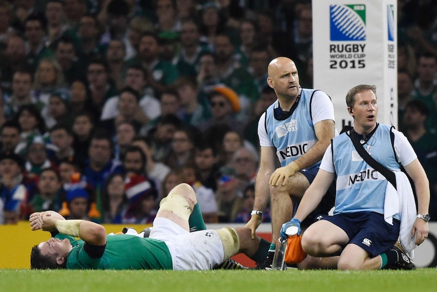 Ireland's Peter O'Mahony seen to by trainers at the Rugby World Cup