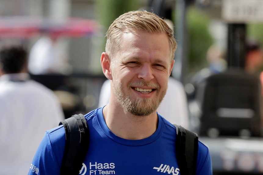 Kevin Magnussen arrives at the track for the Abu Dhabi Grand Prix