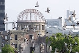 Doves flutter over gutted A-bomb dome at A-bomb anniversary in Hiroshima. (Yuriko Nakao: Reuters, file photo)