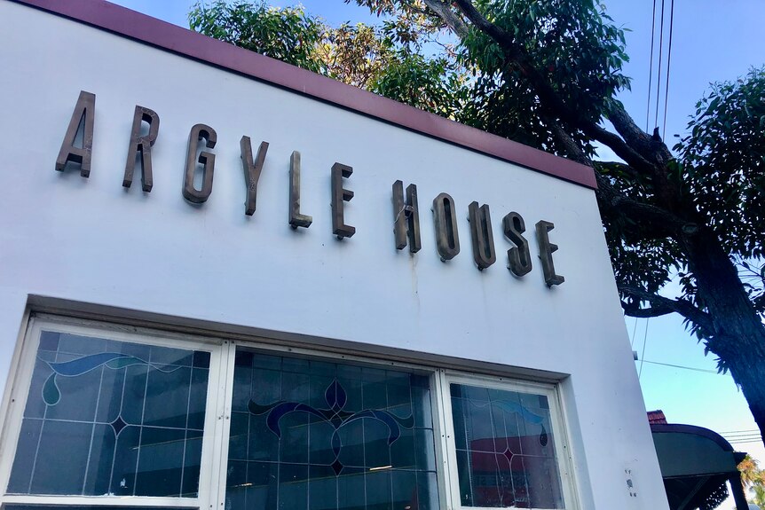 A sign reading Argyle House on a nightclub building.