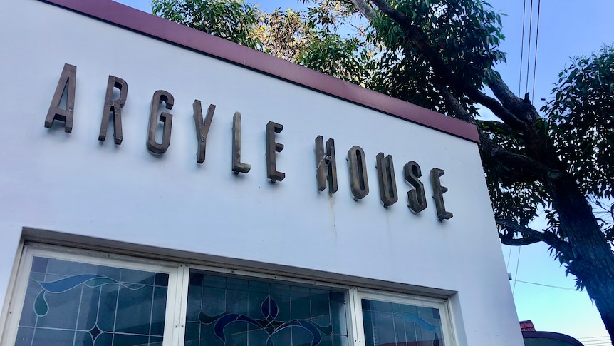 A sign reading Argyle House, on the nightclub building.