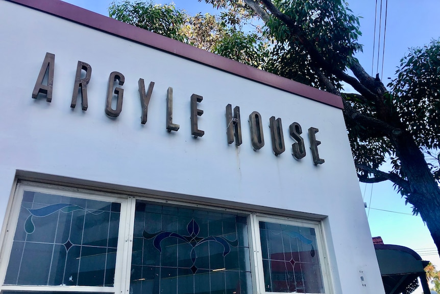 A sign reading Argyle House, on the nightclub building.