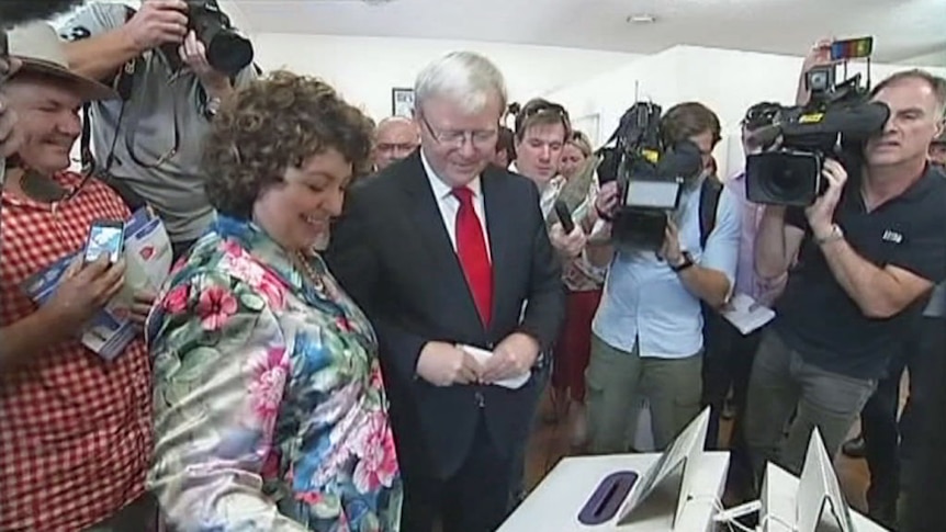 Chaotic scenes as Kevin Rudd votes