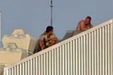 Two prisoners protest on roof of Brisbane Correctional Centre