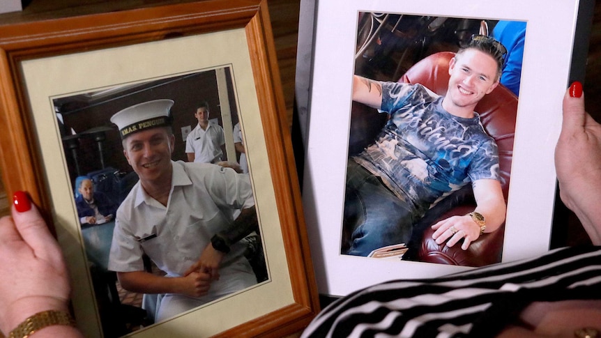 Framed photos of Donna Anderson's sons.