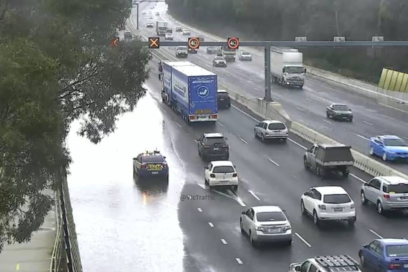Floods close two lanes on Melbourne's Ring Road.