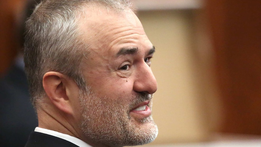 Nick Denton, founder of Gawker, talks with his legal team.