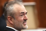 Nick Denton, founder of Gawker, talks with his legal team.