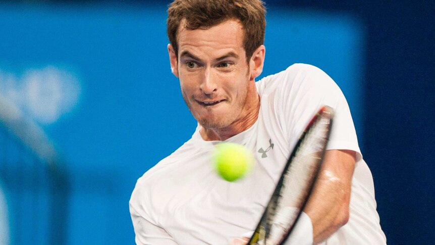 Great Britain's Andy Murray returns a ball against France's Benoit Paire at the Hopman Cup.