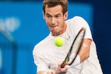 Great Britain's Andy Murray returns a ball against France's Benoit Paire at the Hopman Cup.
