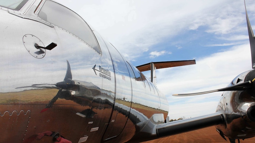 An Embraer EMB 120 Brasilia commuter airliner at the aircraft graveyard at Alice Springs Airport.