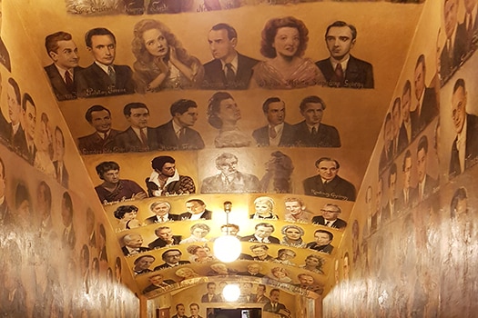 The artist's corridor of the Hungarian State Opera House featuring paintings of former singers for the company.