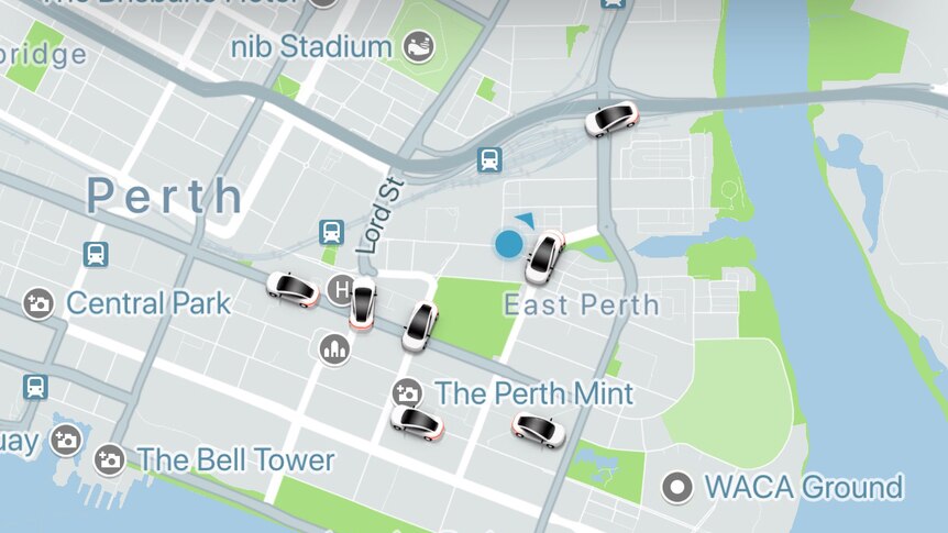 A screenshot from the Uber smartphone app showing available rides in East Perth, represented by cars on a map.