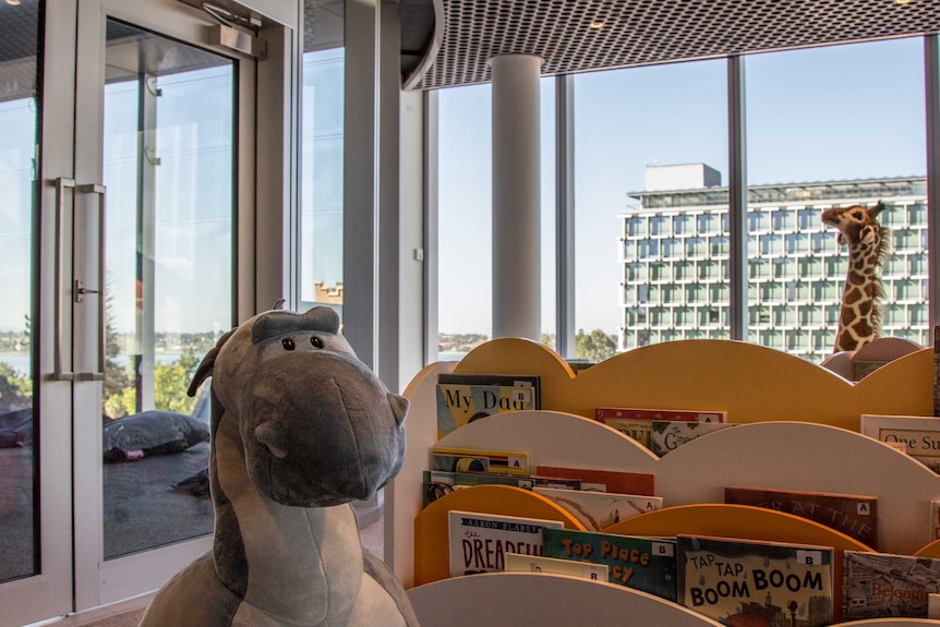 The fourth floor children's level includes toys, cushions and a storytelling space.