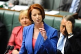 Julia Gillard holds up finger in question time