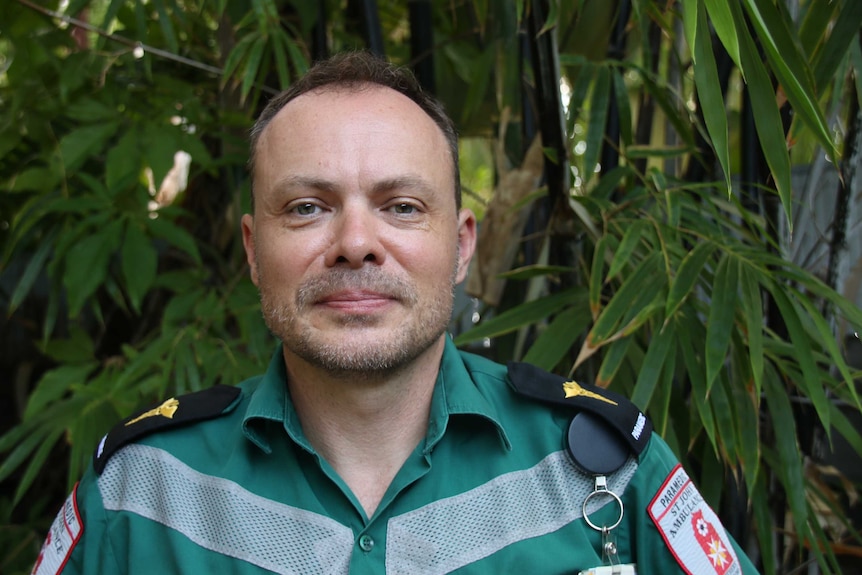 Paramedic Steve Schrieke stands outside, looking at the camera