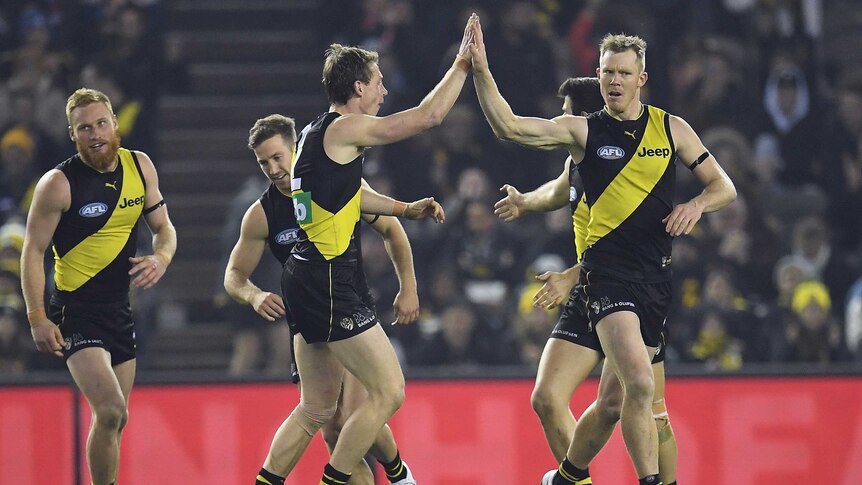 Jack Riewoldt of the Tigers reacts after kicking a goal against the Swans.