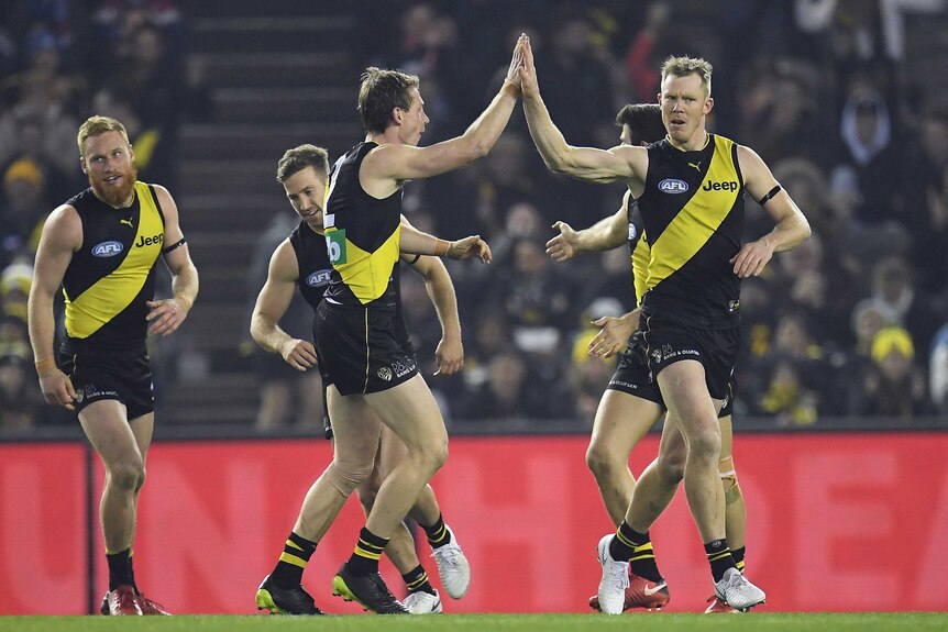 Jack Riewoldt of the Tigers reacts after kicking a goal against the Swans.