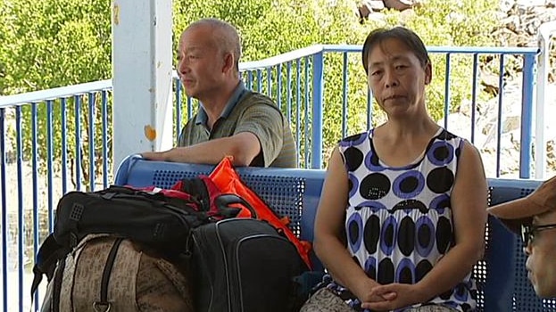 Passengers from Chinese yacht stay at Darwin ferry terminal