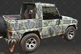 A 1986 Camouflaged Diahatsu Rocky with the rear canopy removed and no registration plates.