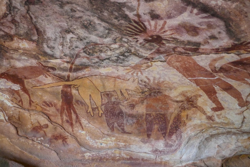 Indigenous depictions of kangaroo and human figures.