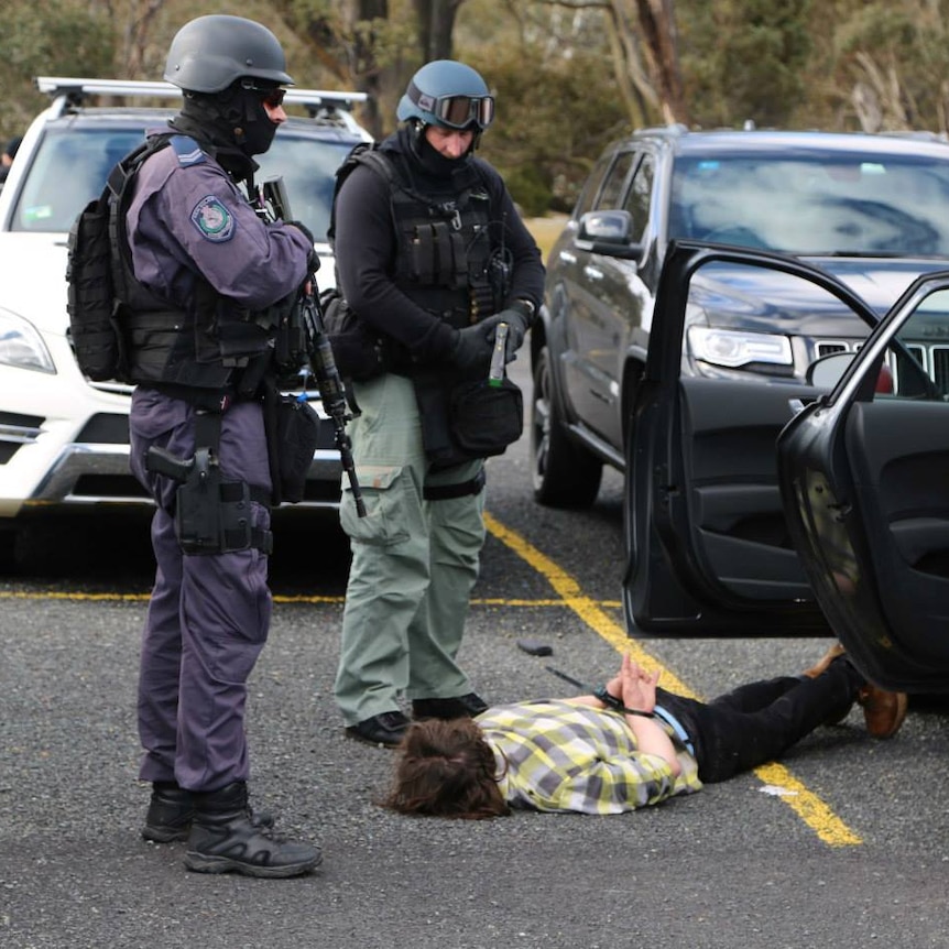 NSW Police arrest a man at Bullocks Flat